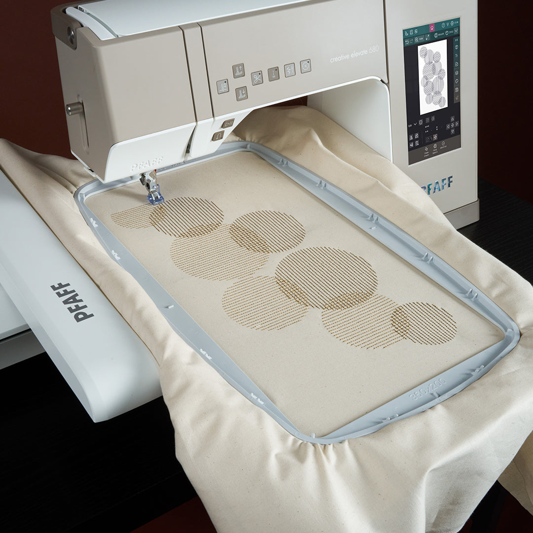 PFAFF Creative Elevate 680 Sewing Machine with embroidery unit attached