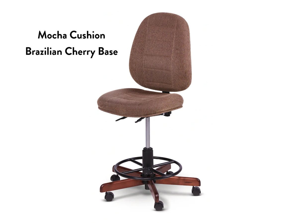 The Koala SewComfort Chair features a mocha cushion, adjustable height, round footrest, and a five-legged Brazilian cherry wood base with casters. Text on the image reads "Mocha Cushion, Brazilian Cherry Base.