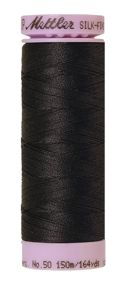 A spool of Mettler Cotton Silk Finish 50wt thread in Mole Gray, 150m/164yds, with light purple plastic ends.