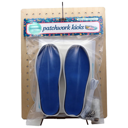 Patchwork Kicks blue insoles with white arch-support bases on display board