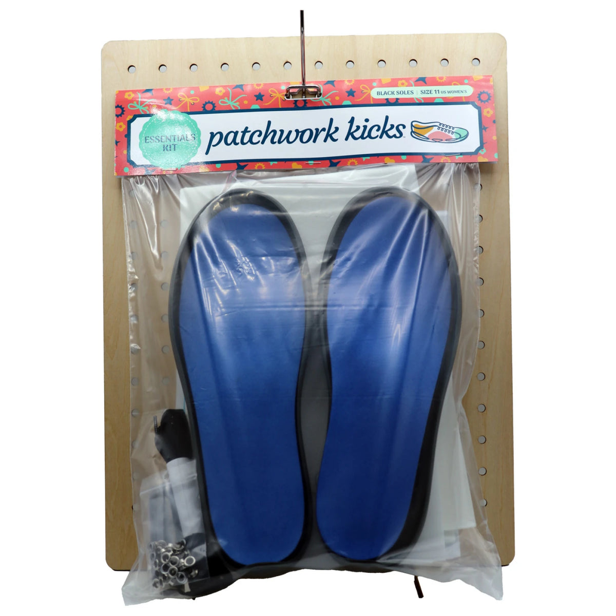 Patchwork Kicks blue arch insoles with dark gray flat sole bases in packaging