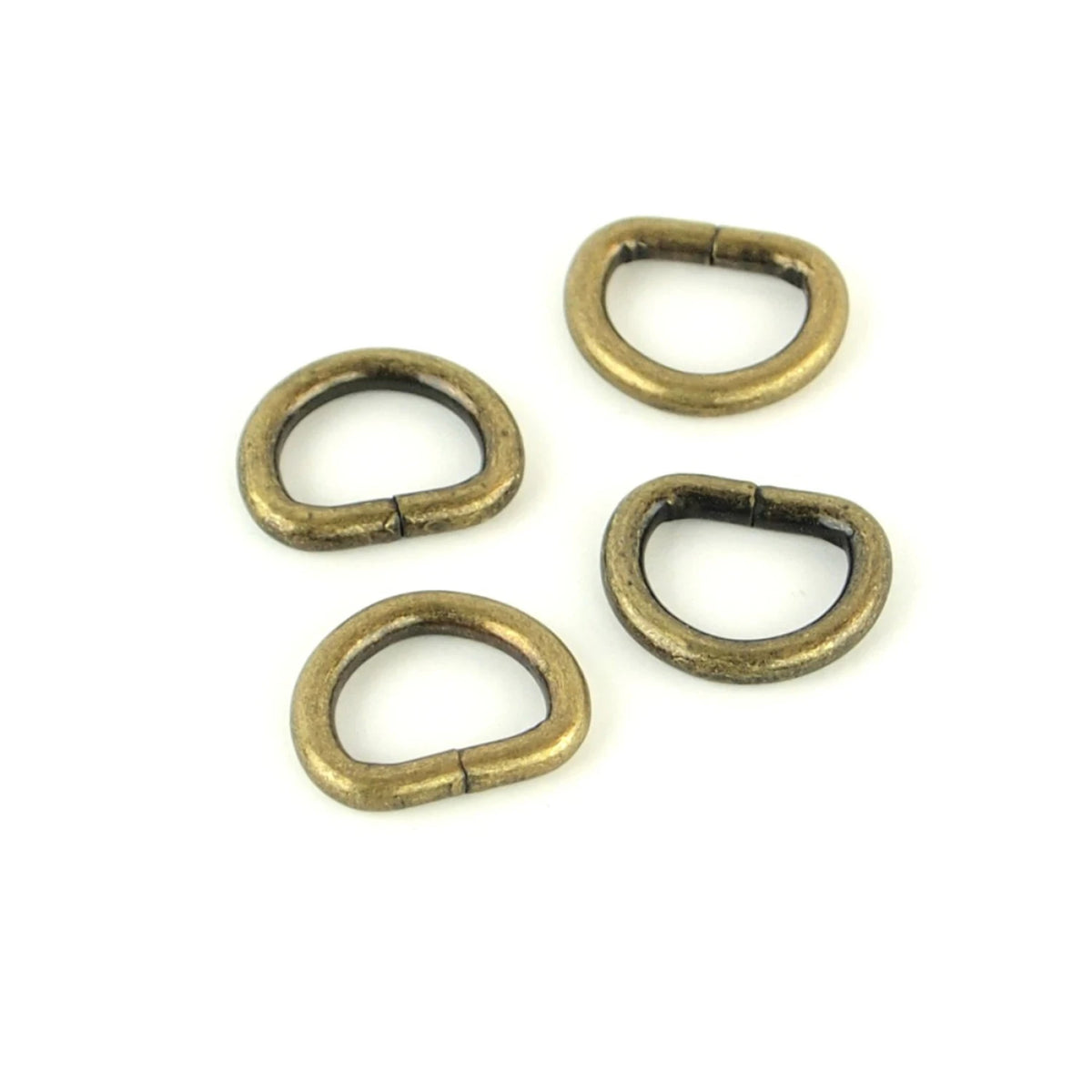 Four antique finish D-rings half inch hardware