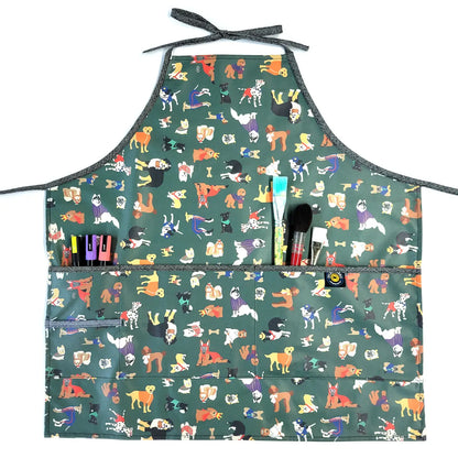 Full Apron in Laminated Cotton, Yard Dogs in Green - image 1 - quilting supply from Quilted Joy