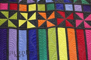 Don't let feathers intimidate you. Learn a variety of feathers on longarm quilting machines from instructor Angela Huffman in this hands on class.